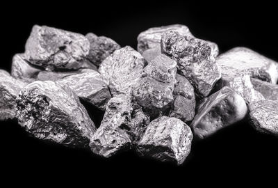 Close-up of rocks against black background