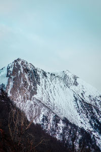 Scenic view of snowcapped mountain against sky