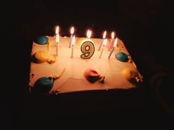 View of candles on birthday cake