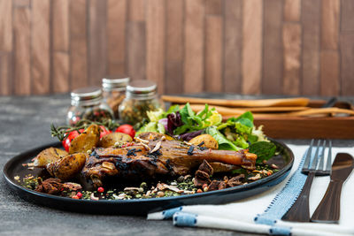 Close-up of food served on table