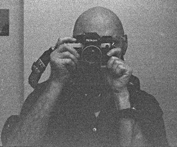 Portrait of man photographing