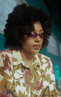 Portrait of young woman wearing sunglasses