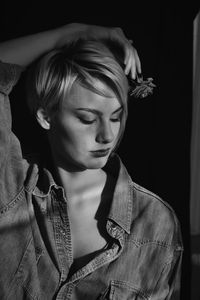 Close-up of young woman with eyes closed