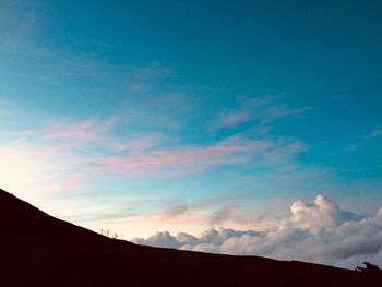 Scenic view of silhouette mountain against sky