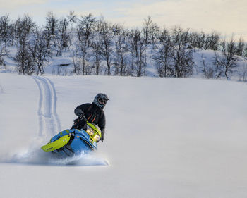 Man skiing on snow