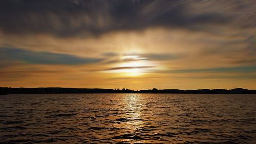 Scenic view of sea against sky during sunset