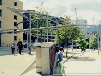 Woman standing in city