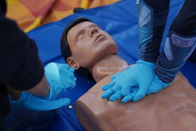 Low angle view of young woman lying on bed