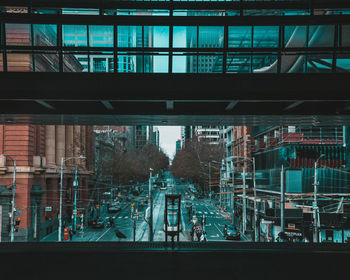 View of railroad station platform through window