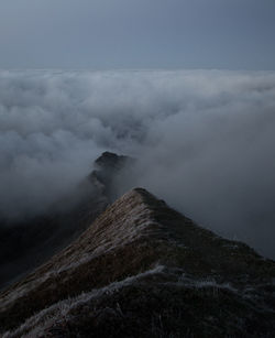 Scenic view of volcanic mountain against sky