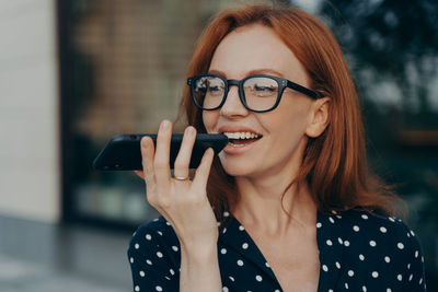 Young woman using mobile phone