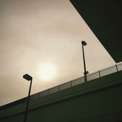 Low angle view of street light against sky