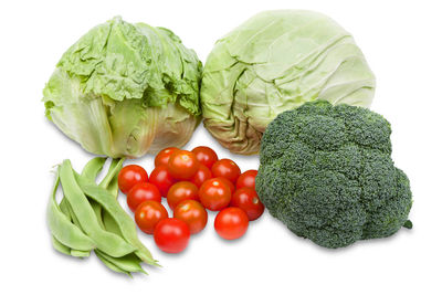 Fruits and vegetables on white background