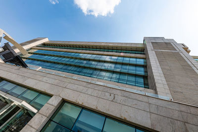 Low angle view of modern building against sky