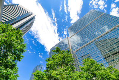 Low angle view of modern buildings against sky