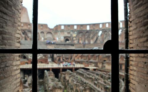 Close-up of buildings seen through window