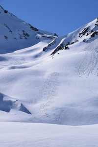 Snow covered mountain against sky