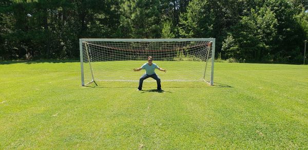 Man playing soccer on field