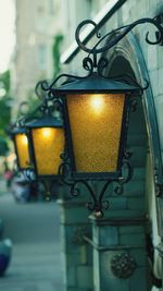 Low angle view of illuminated lamp