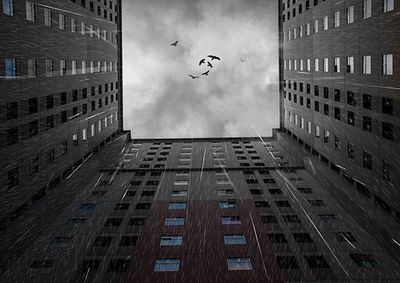 Low angle view of modern buildings in city