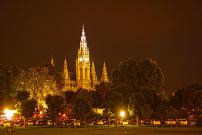 Illuminated buildings in city at night