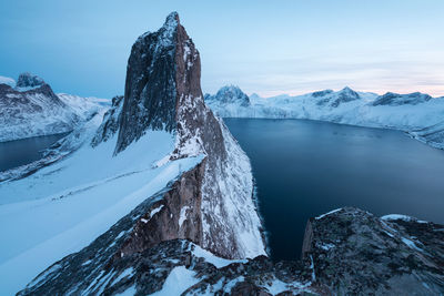 Scenic view of snowcapped mountains against sky during winter