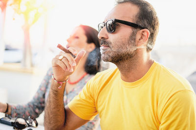 Portrait of young man looking away