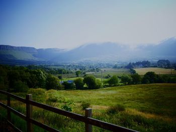 Scenic view of field against sky