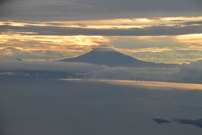 Aerial view of landscape against sky during sunset