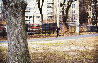 Woman walking on city street