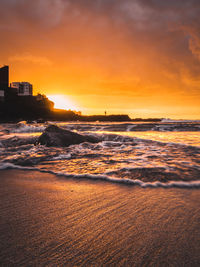 Scenic view of sea against sky during sunset