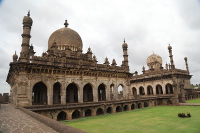 View of historic building against cloudy sky