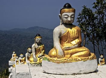 Buddha statue against mountain