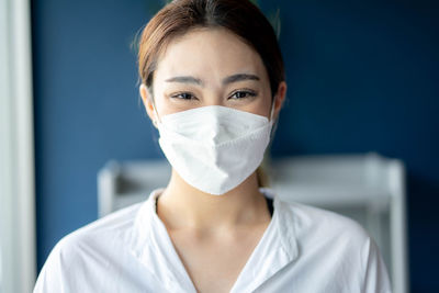 Close-up of woman wearing mask