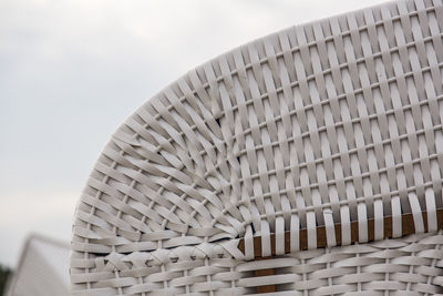 Close-up of wicker basket against white background