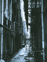 Alley amidst buildings in city