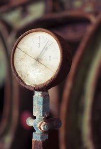 Close-up of rusty pressure gauge