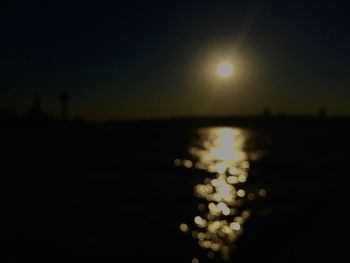 Close-up of water against sky during sunset