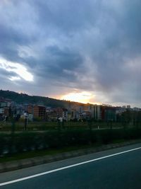 Houses against sky in city