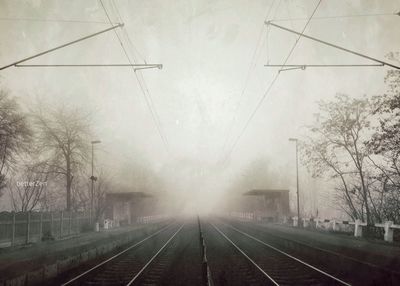 Railroad tracks in foggy weather