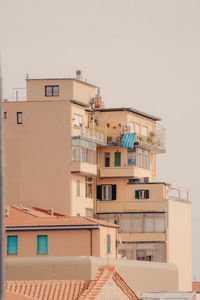 Residential buildings against clear sky