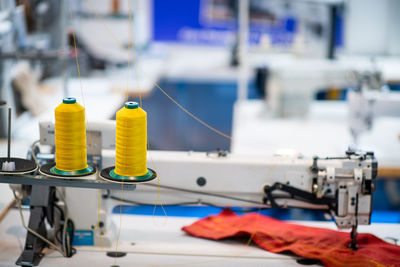 Sewing machine in factory.