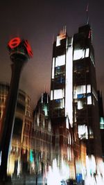 Low angle view of illuminated built structure