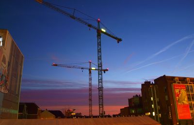 Low angle view of construction site against sky