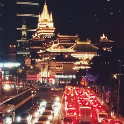 View of illuminated city at night