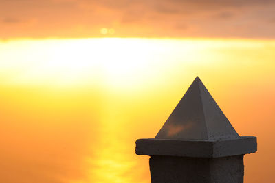 Close-up of monument at sunset