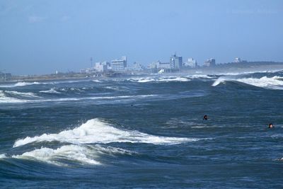 Scenic view of sea against blue sky