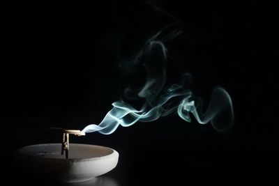 Close-up of smoke against black background