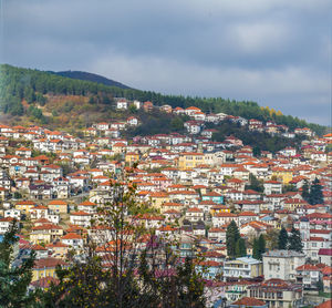 Aerial view of cityscape against sky