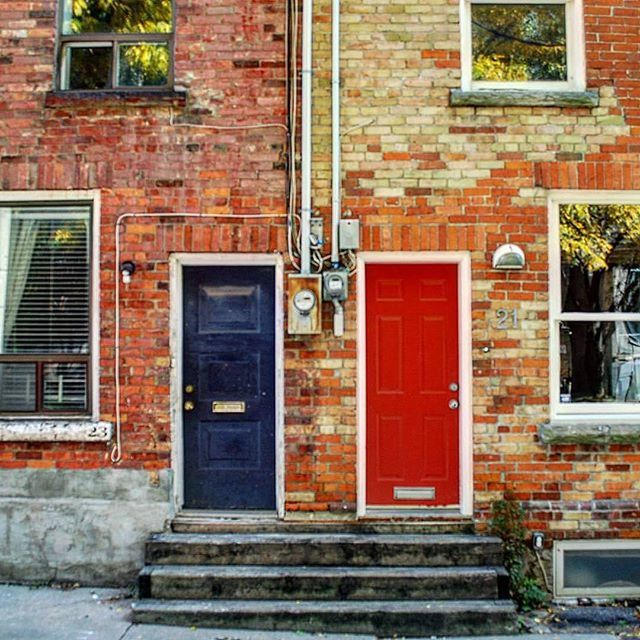 building exterior, architecture, built structure, door, closed, window, entrance, brick wall, house, old, red, residential structure, day, weathered, safety, outdoors, building, wall - building feature, facade, closed door